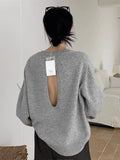 Dodobye Sexy Backless Knitted Sweaters Women Hollow Out Long Sleeve Lazy Wind Pullovers Vintage Loose Casual O Neck Streetwear Tops